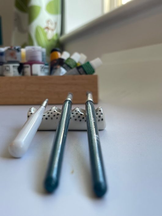 Miniature paint brush holder